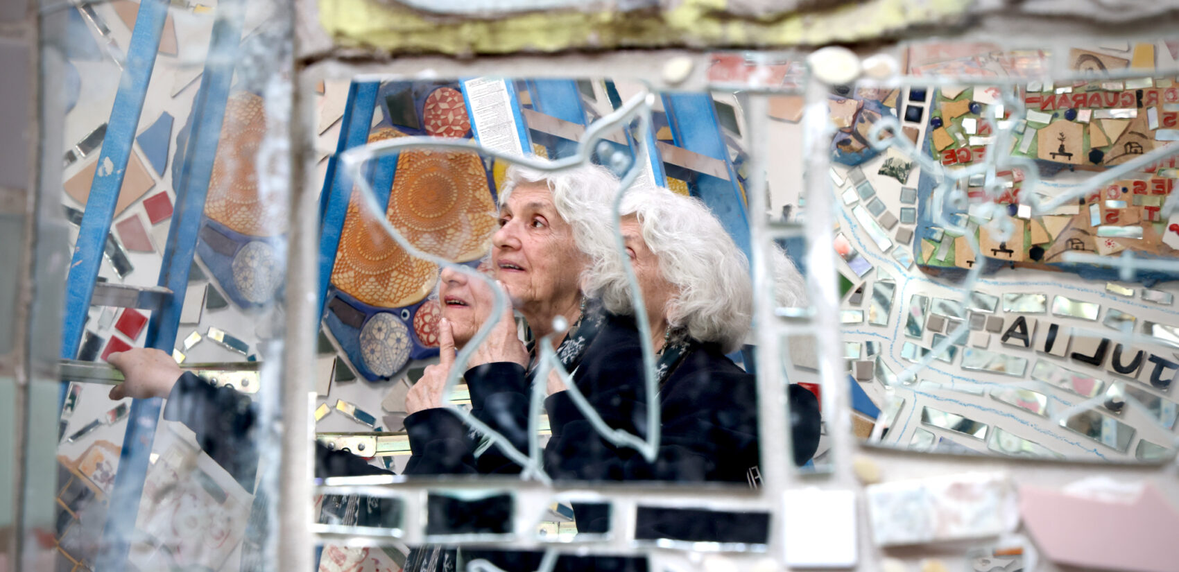 Julia Zagar reflected in a mirrored tile