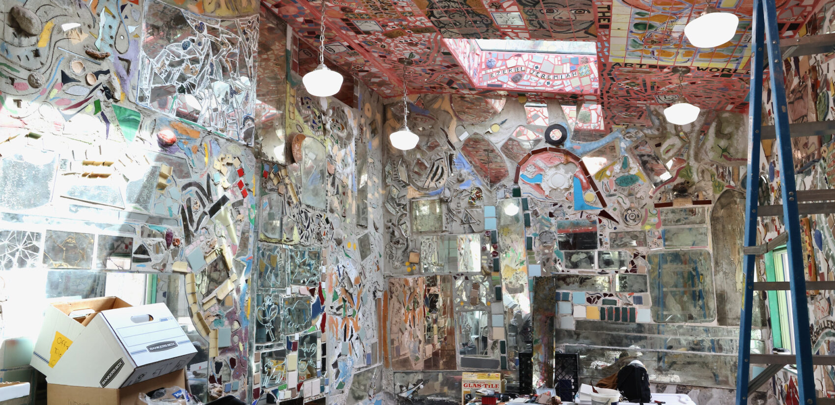a now-uncovered Isaiah Zagar mural