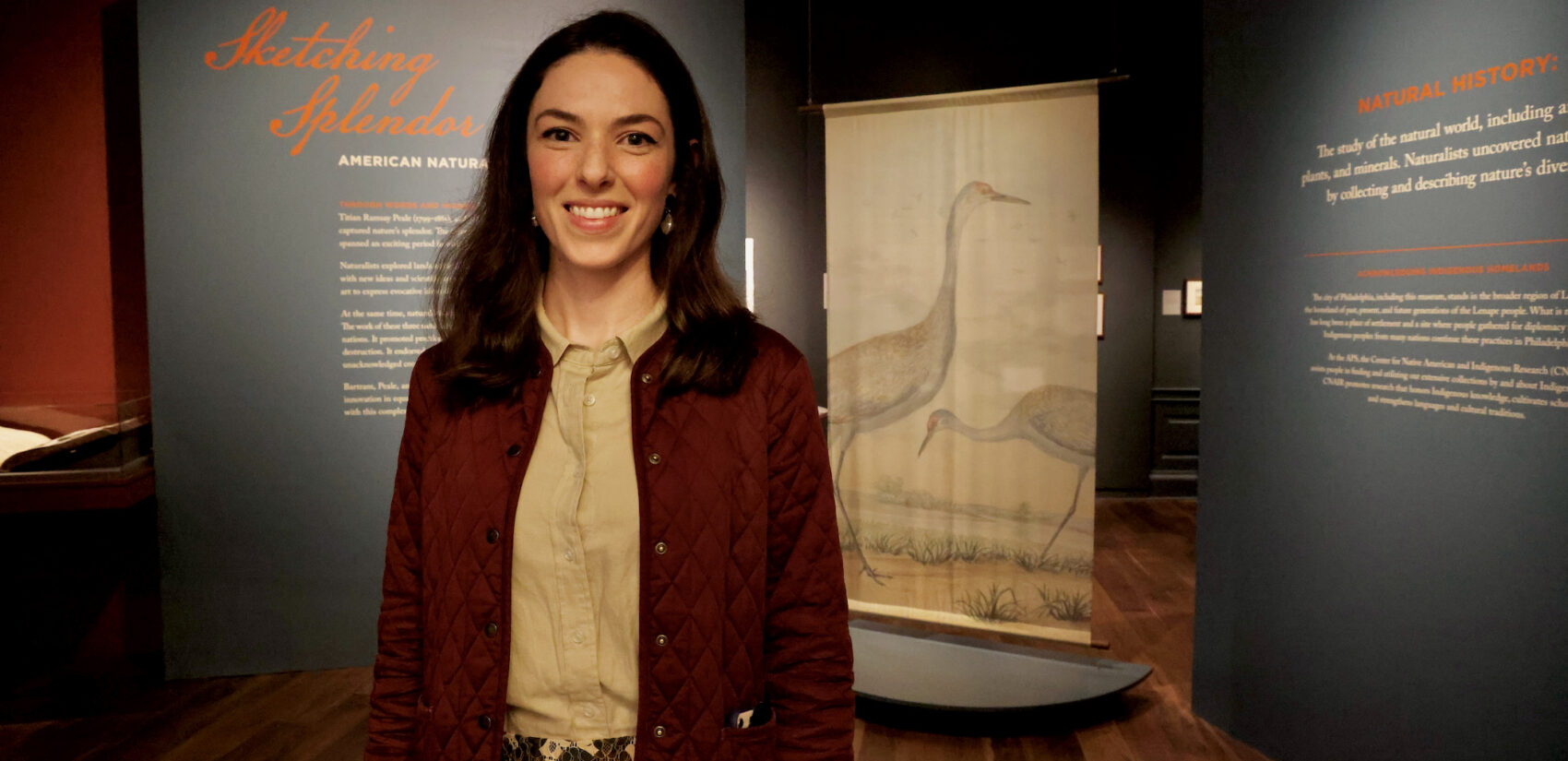 Anna Majeski stands at the exhibit