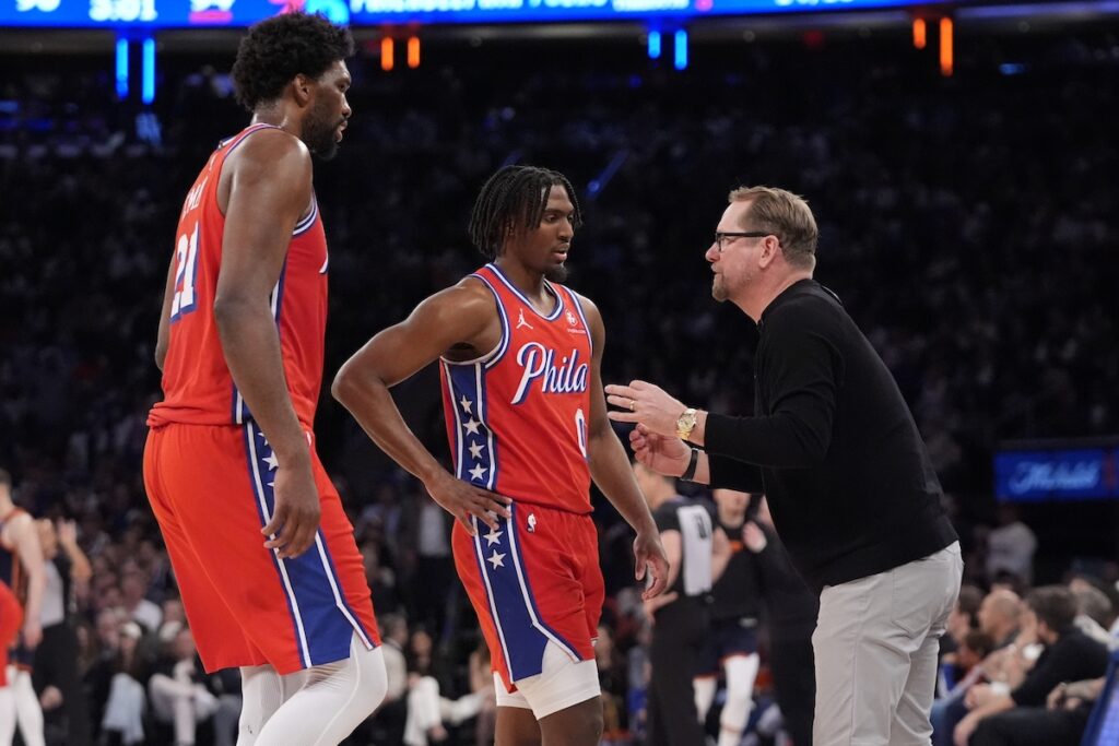 76ers Knicks Basketball Philadelphia 76ers head coach Nick Nurse (right) talks to Tyrese Maxey (center) and Joel Embiid (left) during the second half of Game 2 in an NBA basketball first-round playoff series against the New York Knicks, Monday, April 22, 2024, in New York.