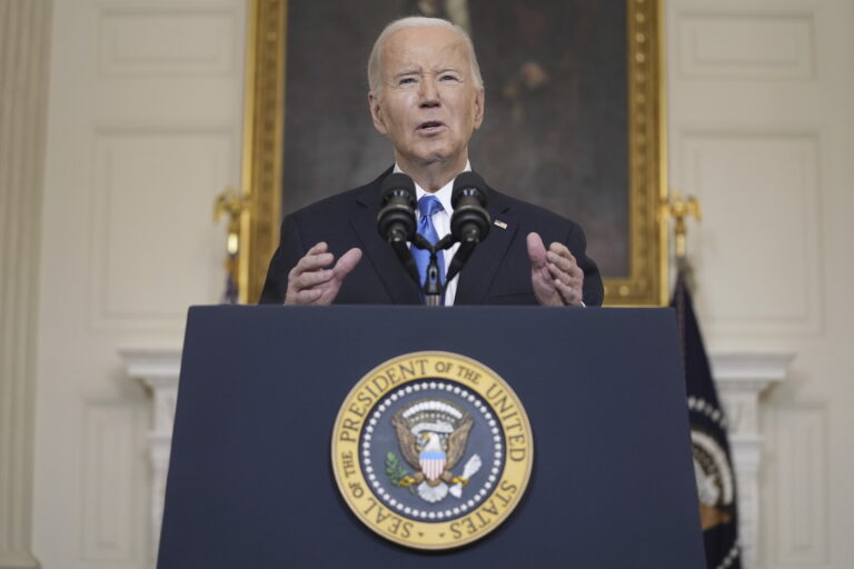 President Biden speaking at a podium