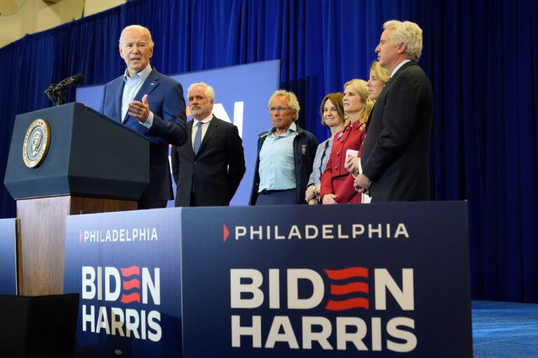 President Joe Biden speaks alongside the Kennedy family