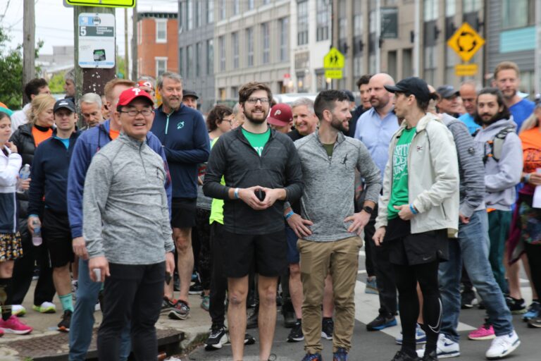 Runners on the corner of Frankford Avenue and Hagert Street