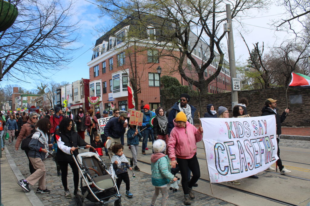 e-neil-20224-04-06-ceasefire-rally-16 people marching in the street for a ceasefire