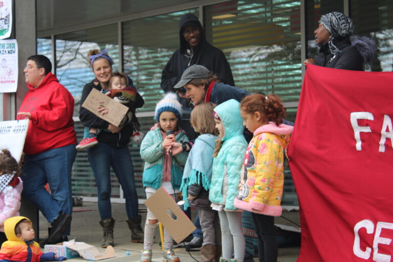 Children speaking into a megaphone