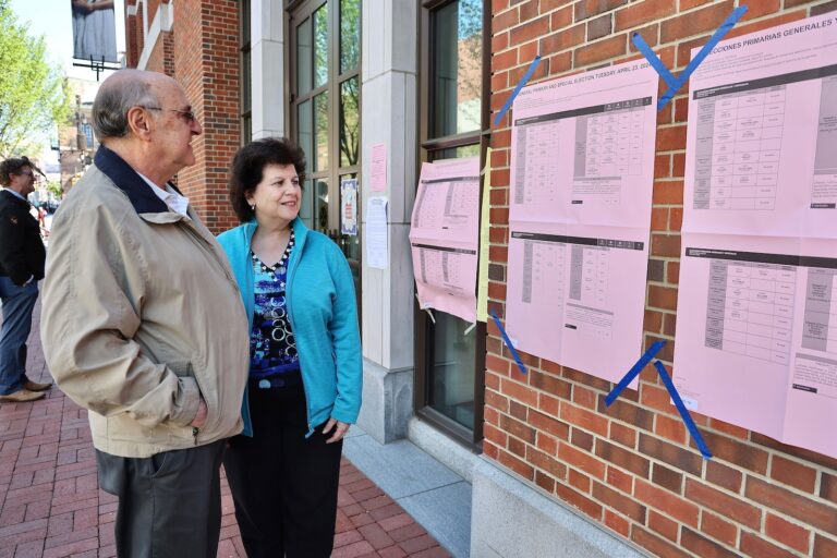 Marty Bergman and Cindy Hoffman appear outside their polling station