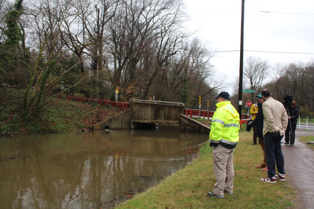 flood-task-force-1 Looking at a flooded canal