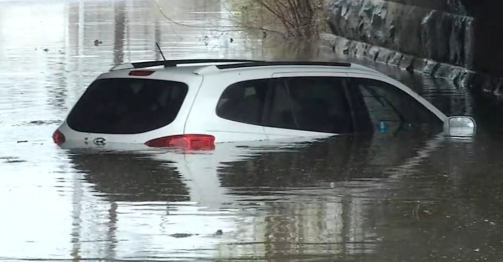 flooding-suburbs-wpvi-040424 A vehicle is seen under water in Stanton, Delaware