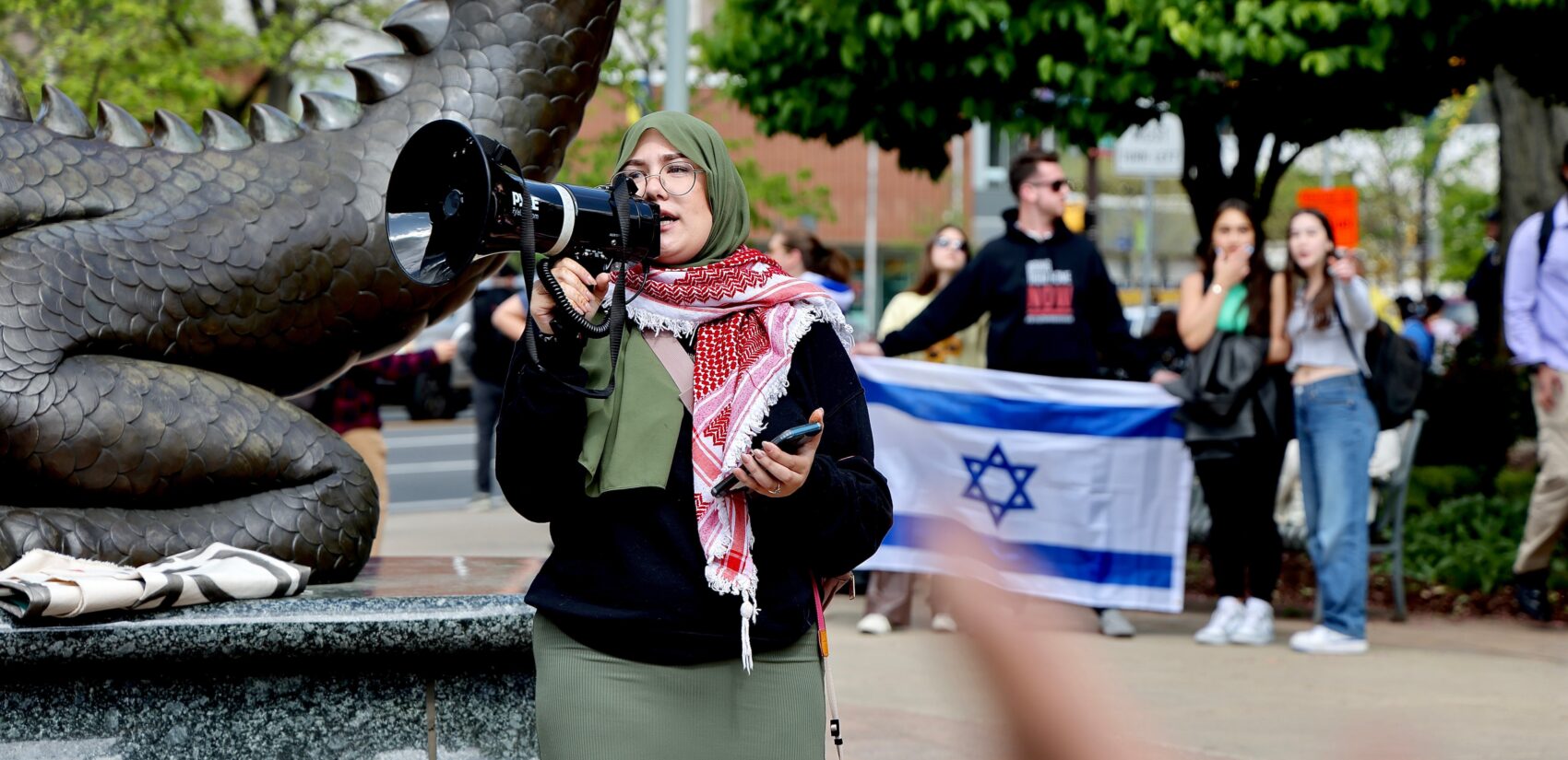 A protester speaks at Drexel
