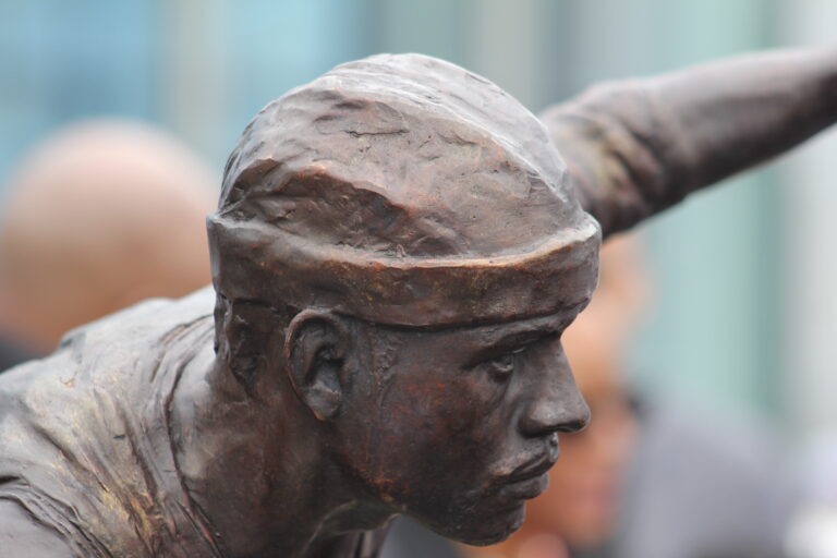 The statue was designed by sculptor Chad Fisher, who created the other Sixers statues outside the training facility. (Cory Sharber/WHYY)