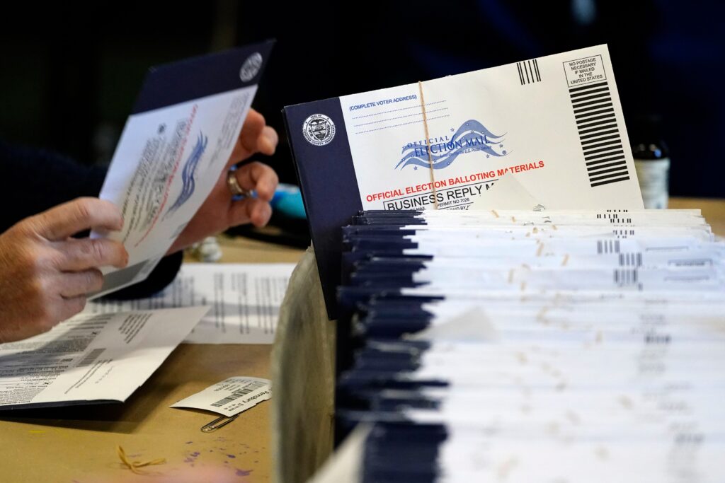 mail ballots being processed
