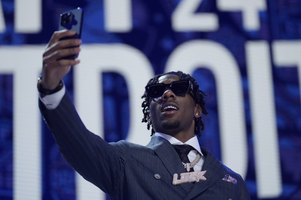 NFL Draft Football Toledo cornerback Quinyon Mitchell walks on stage during the first round of the NFL football draft, Thursday, April 25, 2024, in Detroit.