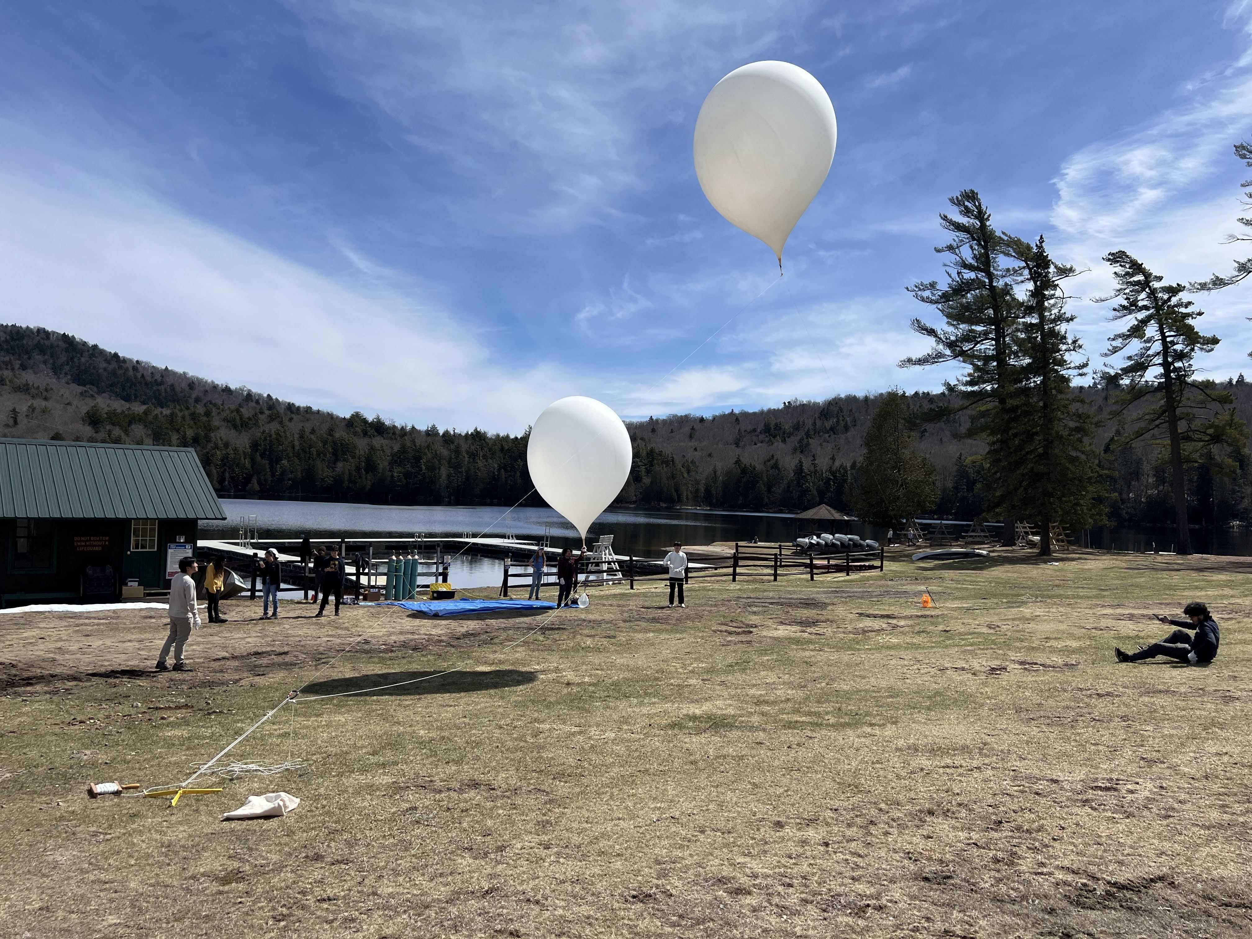 The team from Drexel and Springside Chestnut Hill Academy's balloons