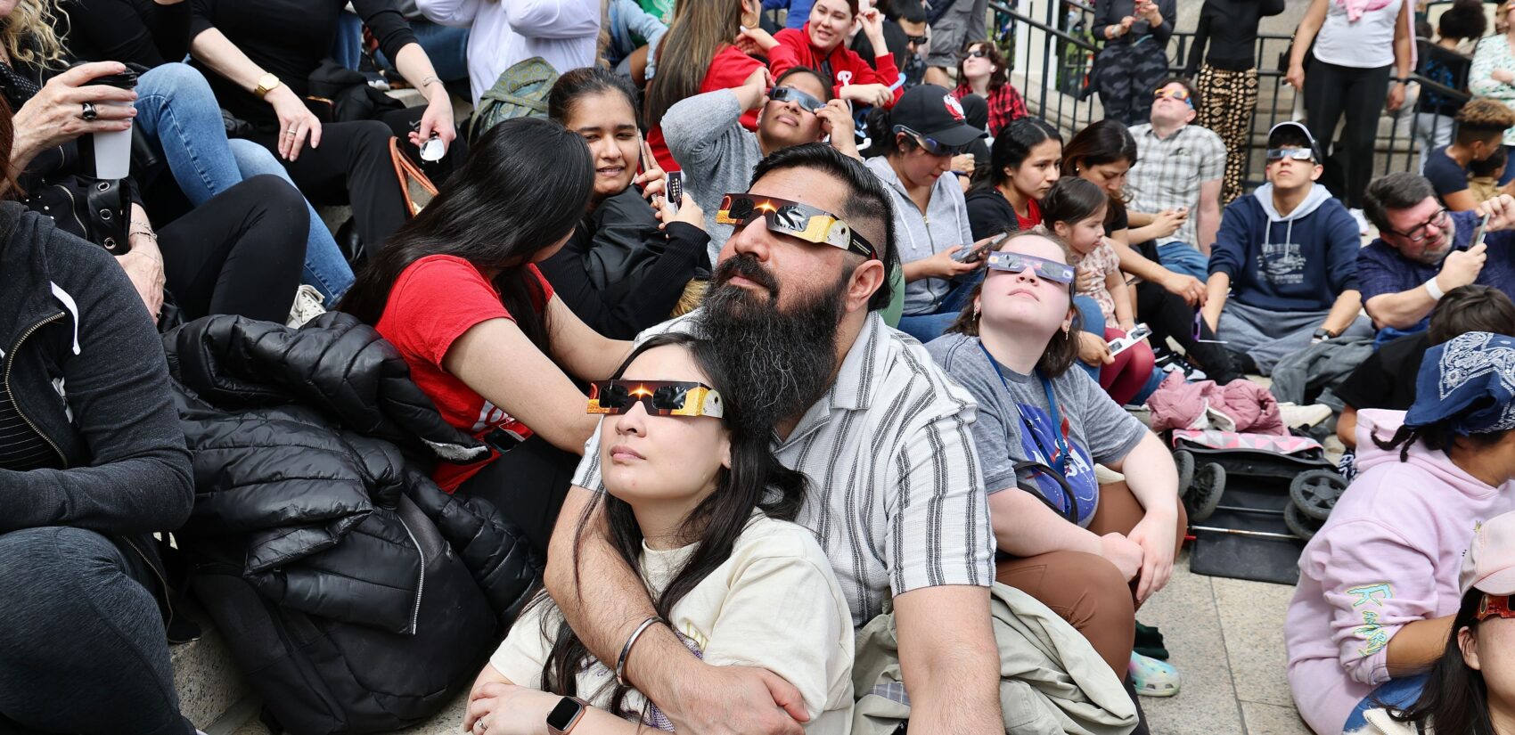 Eclipse viewers on the steps of the Franklin Institute