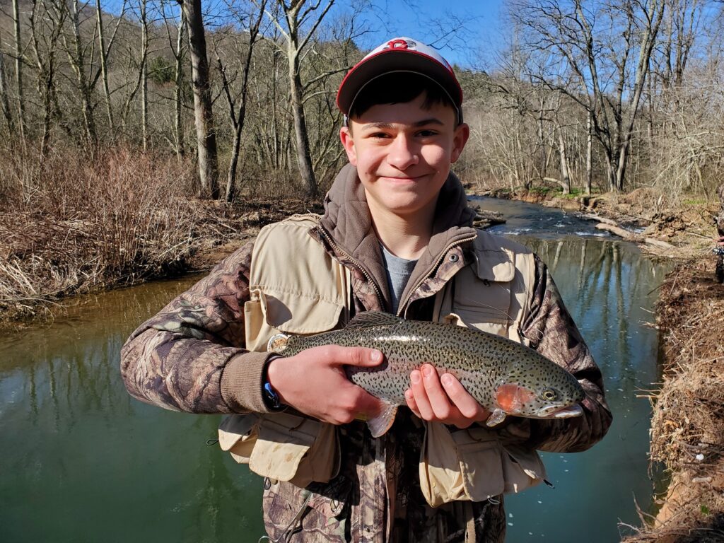 fisher with a trout