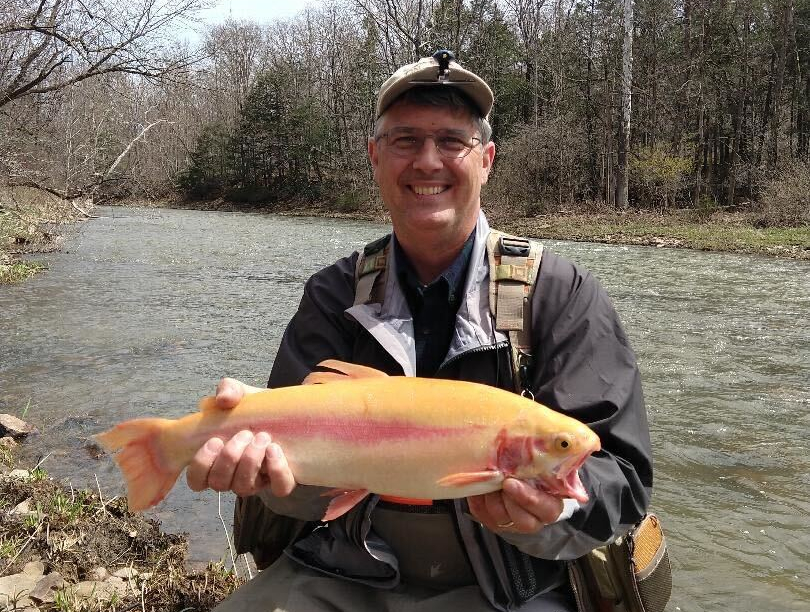 trout-season-pennsylvania-2024-kurt-engstrom (1) Man holds a rainbow trout