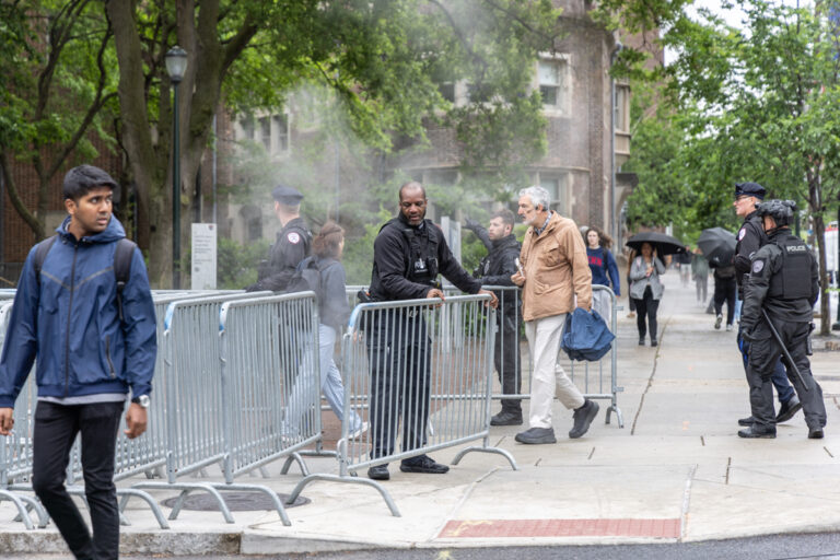 Police removing barricades from the sidewalk