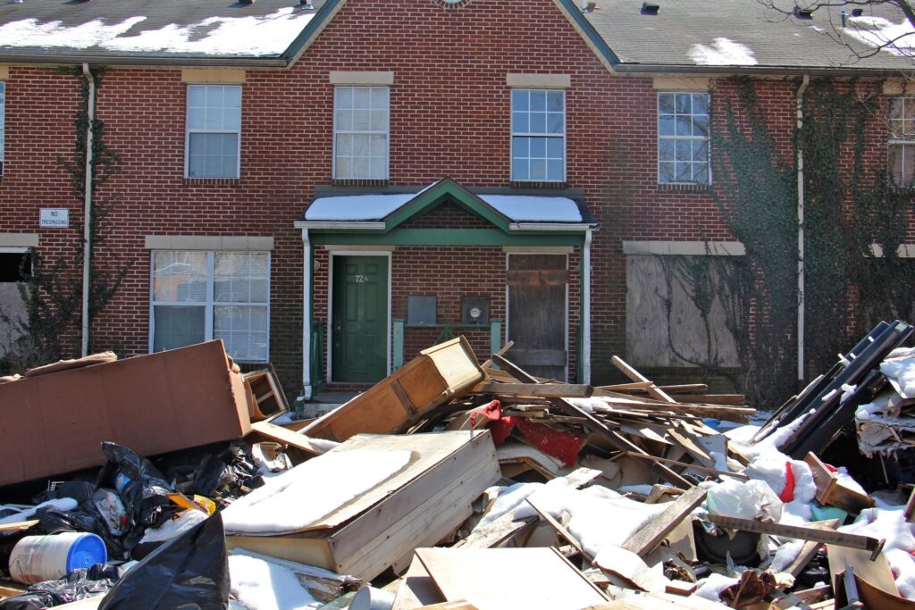 2018-03-15-e-lee-philadelphia-germantown-developer-emanuel-freeman-1 Trash in front of an apartment building entrance