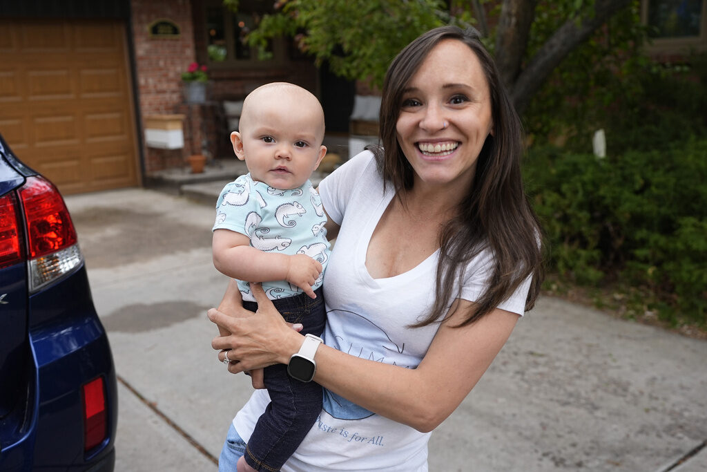 Paid Family Leave A mother and her child smile