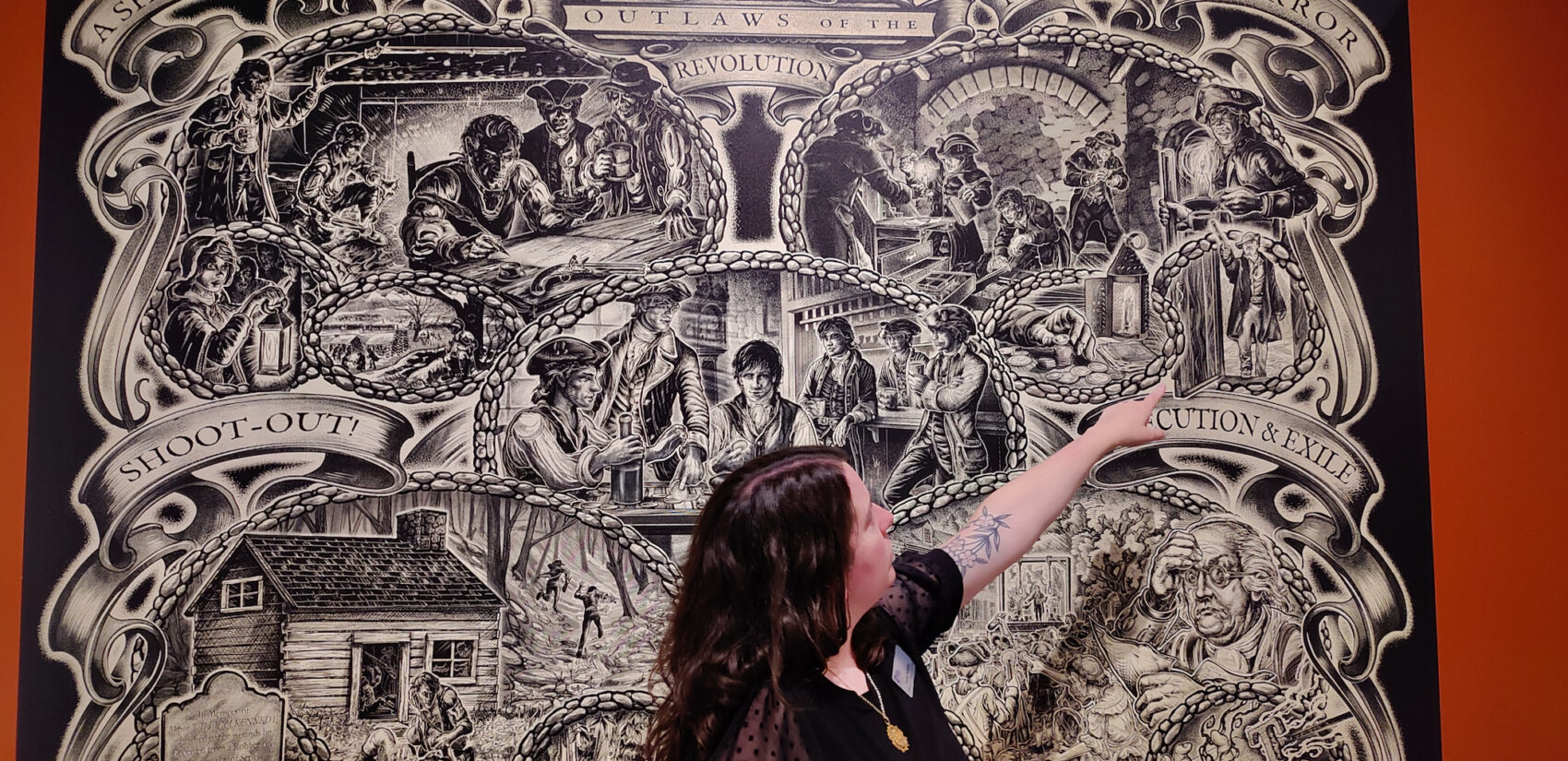 Annie Halliday points to a piece at the Mercer Museum