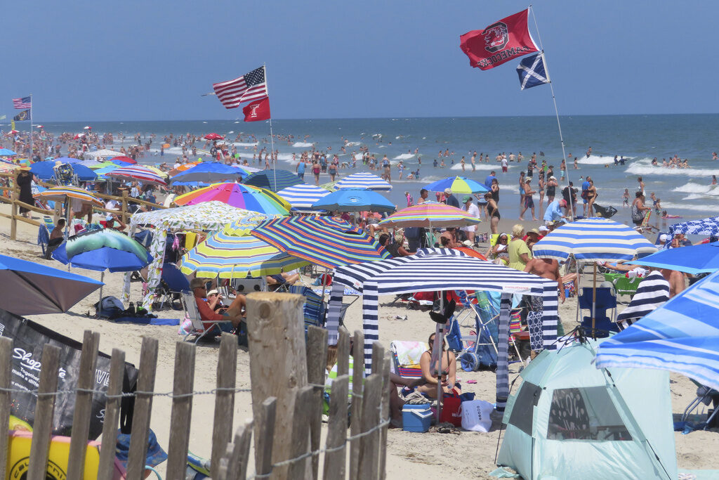 North Wildwood Beachgoers enjoy the sand and surf in North Wildwood N.J. on July 7, 2023. (AP Photo/Wayne Parry)
