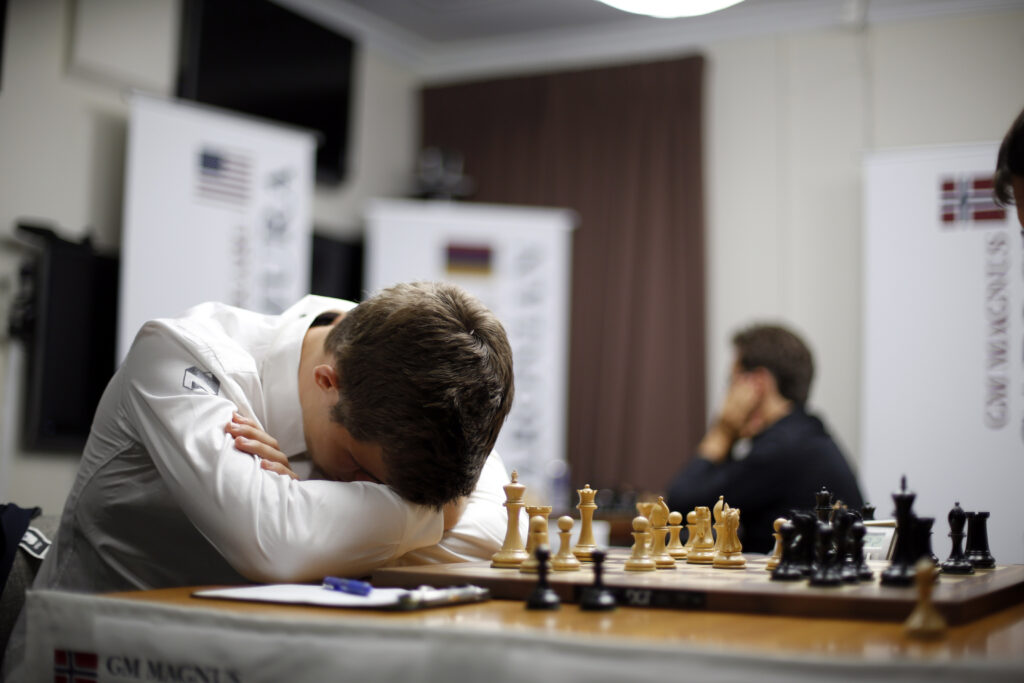 Magnus Carlsen Magnus Carlsen, of Norway, rests during his match against Maxime Vachier-Lagrave, of France, in the sixth round of the Sinquefield Cup chess tournament Tuesday, Sept. 2, 2014, in St. Louis. (AP Photo/Jeff Roberson)
