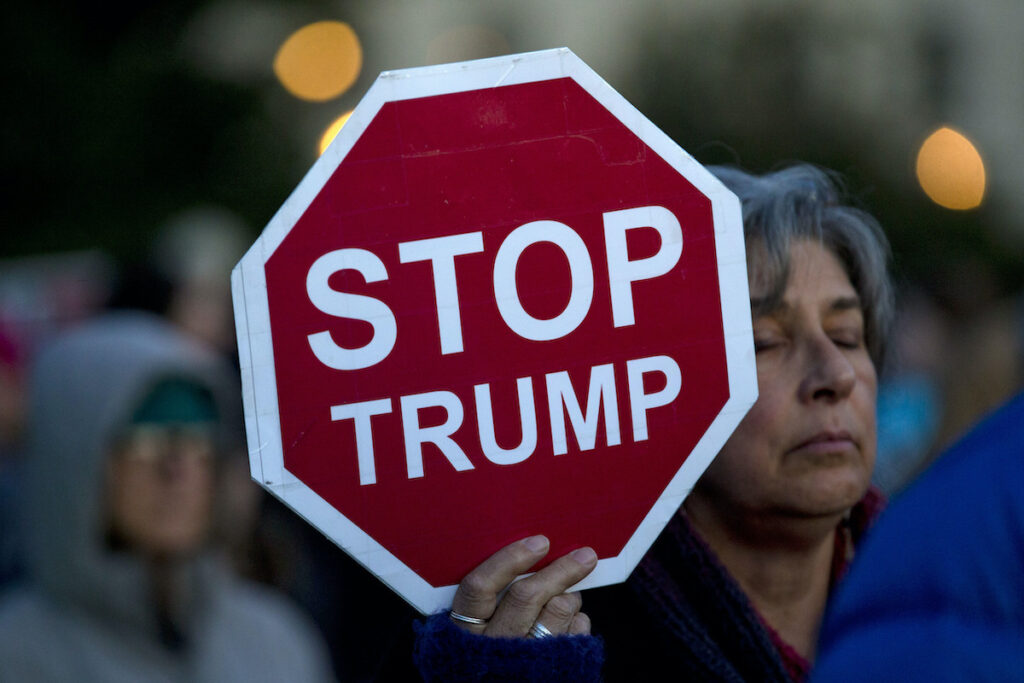 Demonstrators protest outside of the U.S. Capitol
