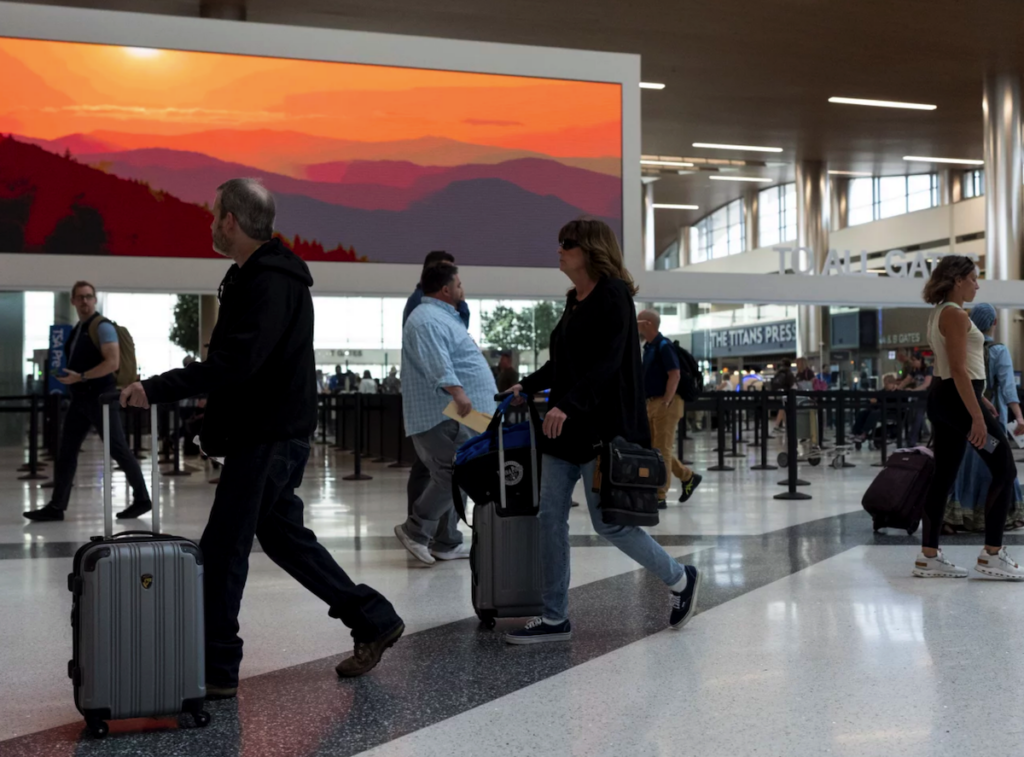 People in a busy airport terminal