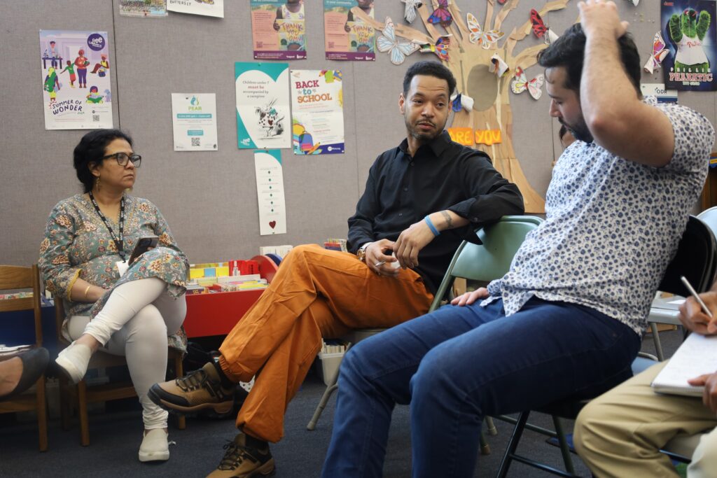 Kensington residents and community members highlight local programs and services in the area during WHYY’s Bridging Blocks discussion at Kensington Library on May 22, 2024.