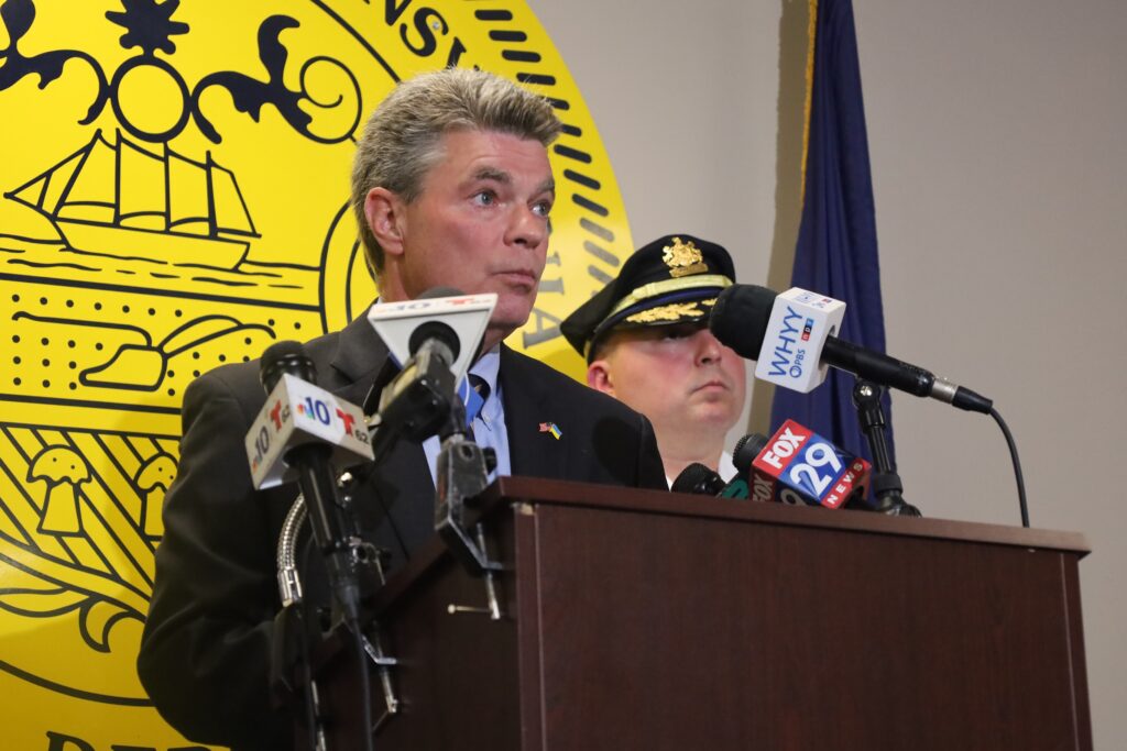 charges-announced-chester-shooting-may-2024-jack-stollsteimer-steven-Gretzky District Attorney Jack Stollsteimer and Chester Police Commissioner Steven Gretzky stand behind a podium
