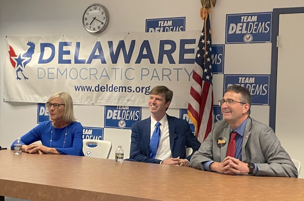 del-forum-c-barrish-2024-05-17-group image Bethany Hall-Long, Collin O'Mara and Matt Meyer sit at a table.