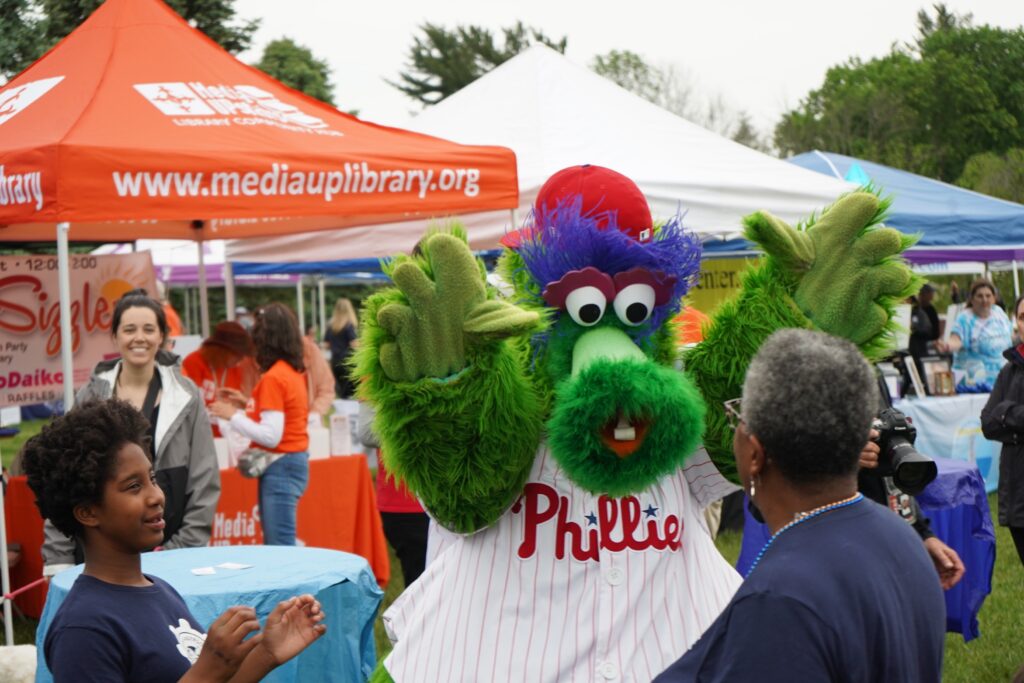 delco-gives-day-2024-7 Phillie Phanatic and attendees