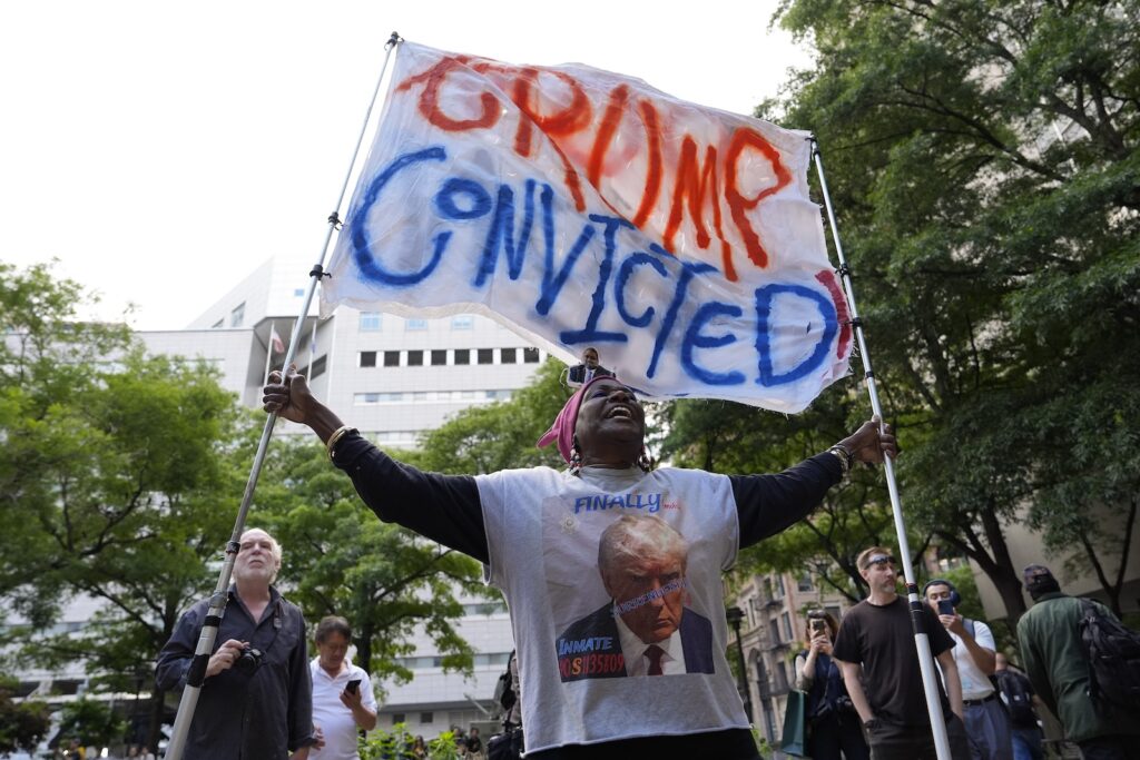 Trump Hush Money A demonstrator reacts to the guilty verdict announced against former President Donald Trump outside Manhattan Criminal Court