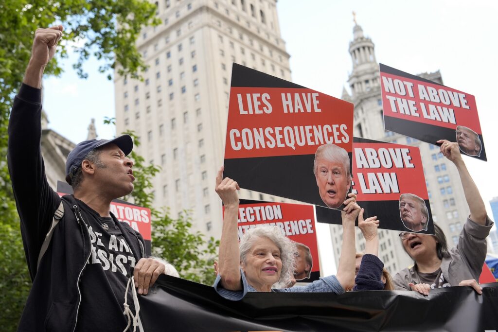 Trump Hush Money People react to the guilty verdict announced against former President Donald Trump outside Manhattan Criminal Court, Thursday, May 30, 2024, in New York.
