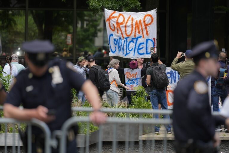 People react to the guilty verdict announced against former President Donald Trump outside Manhattan Criminal Court, Thursday, May 30, 2024, in New York.