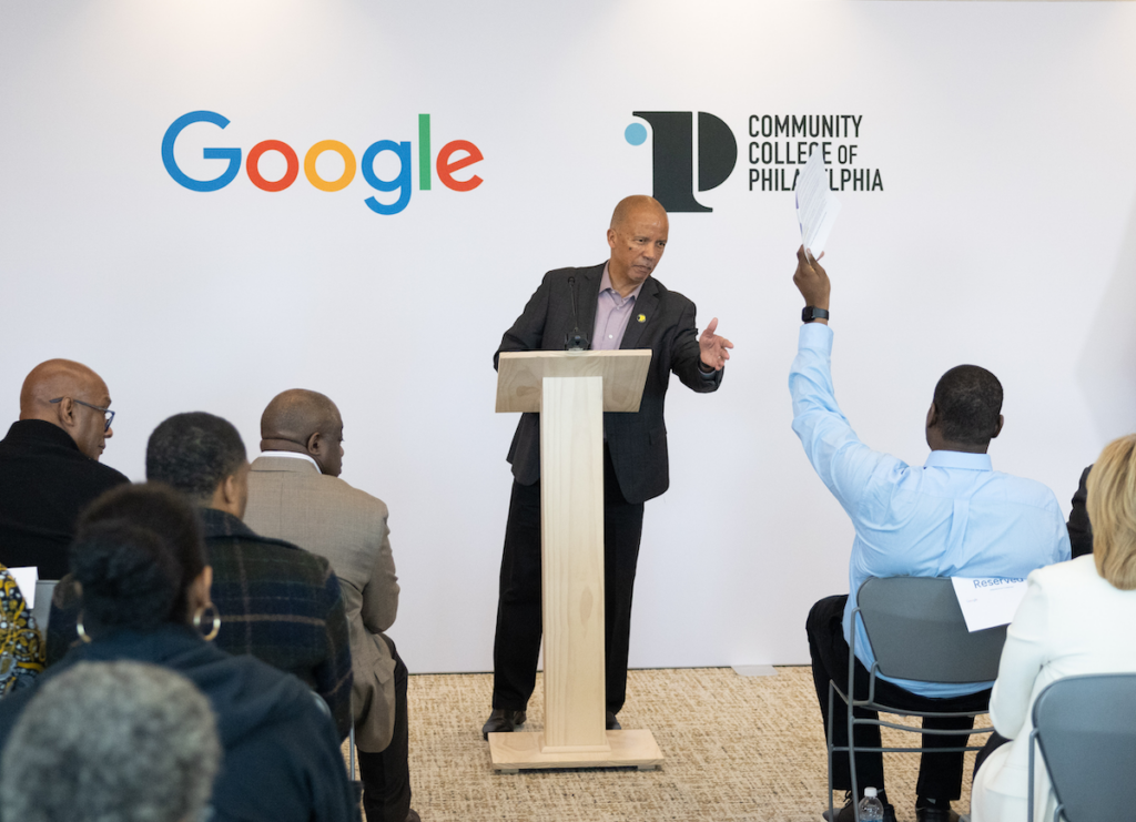 Guy Generals speaking at a podium.