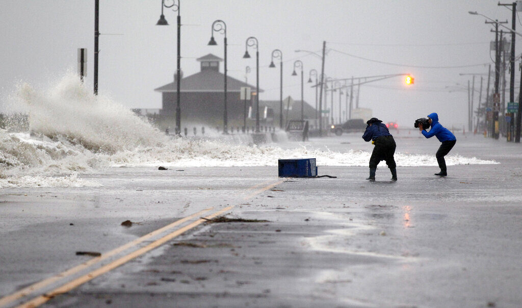 Superstorm people photograph wet weather as the hurricane arrives
