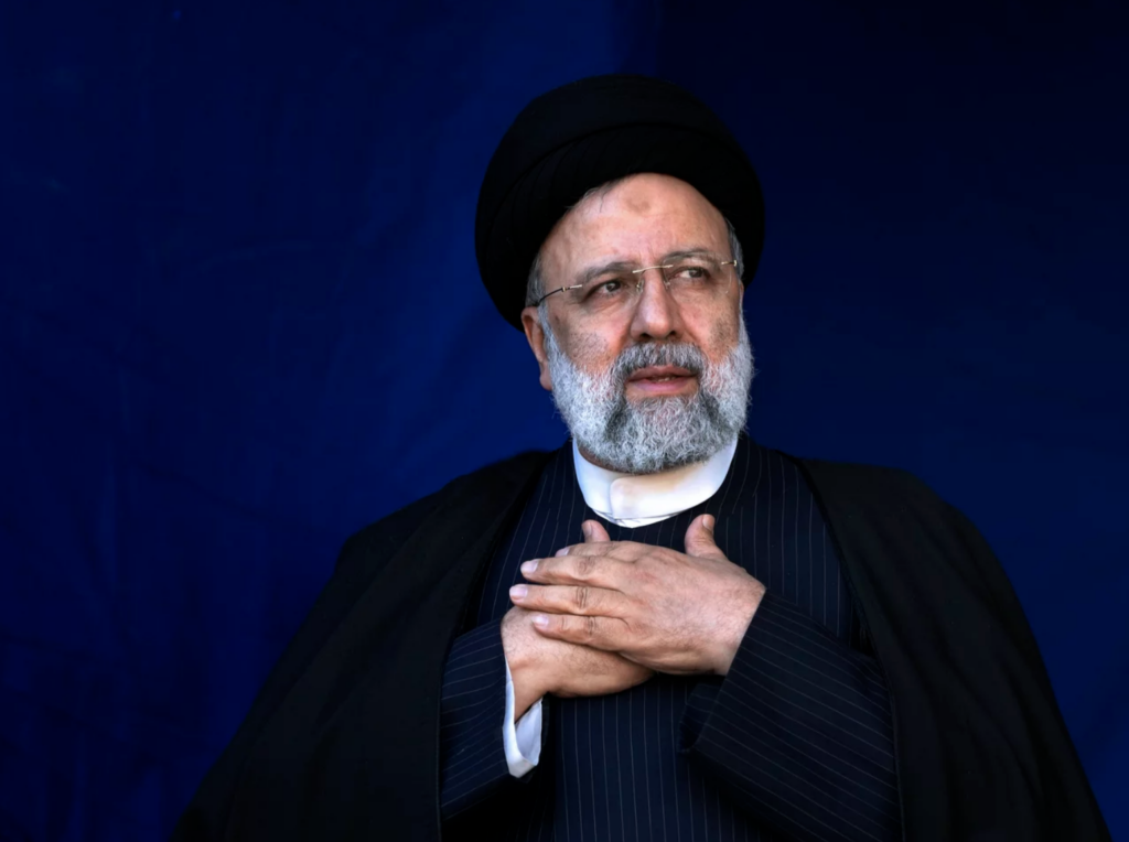 iranian-president-ebrahim-raisi-AP Iranian President Ebrahim Raisi is shown placing his hands on his heart as a gesture of respect to the crowd during the funeral ceremony of the victims of a bomb explosion in the city of Kerman, Iran, on Jan. 5, 2024.