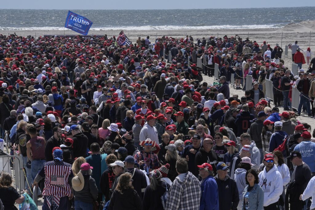People wait in line to enter a campaign rally for Republican presidential candidate former President Donald Trump in Wildwood, N.J., Saturday, May 11, 2024. (