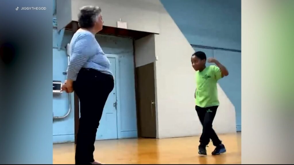 veggie-dance-off-viral-video-kensington a 2nd grader and a teacher dancing