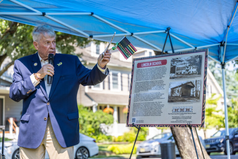 Jack Tarditi speaking into a microphone