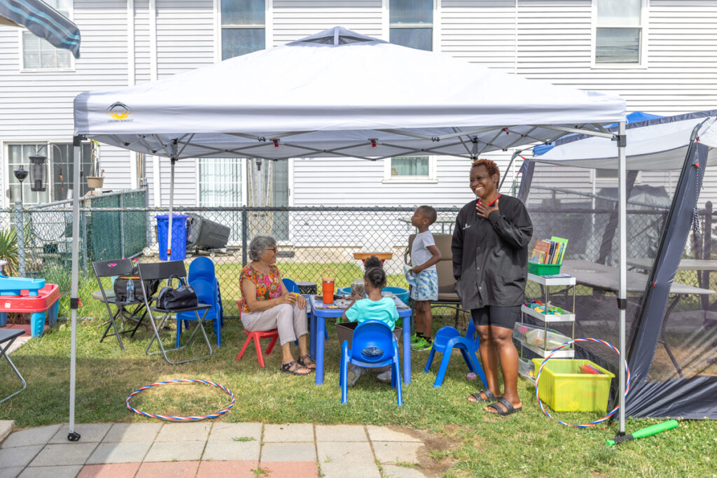 Playing under a tent outdoors
