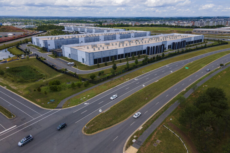 Data centers are in Ashburn in Loudon County, Virginia, on Sunday, July 16, 2023. The centers house the computer servers and hardware required to support modern internet use, including artificial intelligence. The county is home to the world's largest concentration of data centers. (AP Photo/Ted Shaffrey)