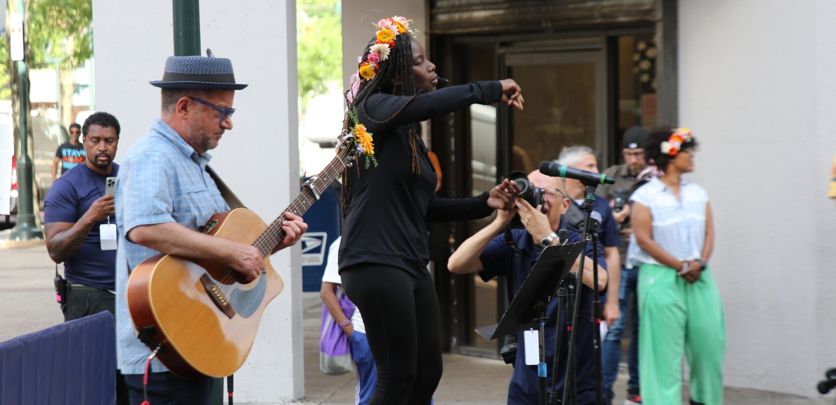 Hundreds packed Seventh Street next to the Declaration House on Monday for a block party celebrating the building's exhibit produced by Monument Lab. (Cory Sharber/WHYY)