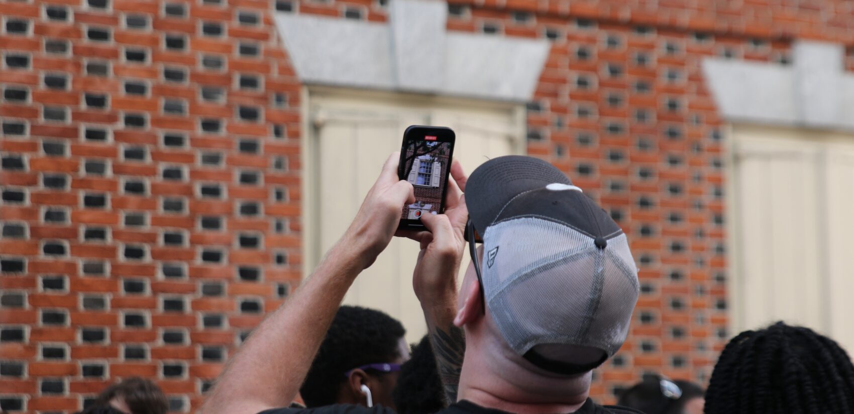 Attendees made sure to document the exhibit that runs until Sept. 8 at the Declaration House. (Cory Sharber/WHYY)