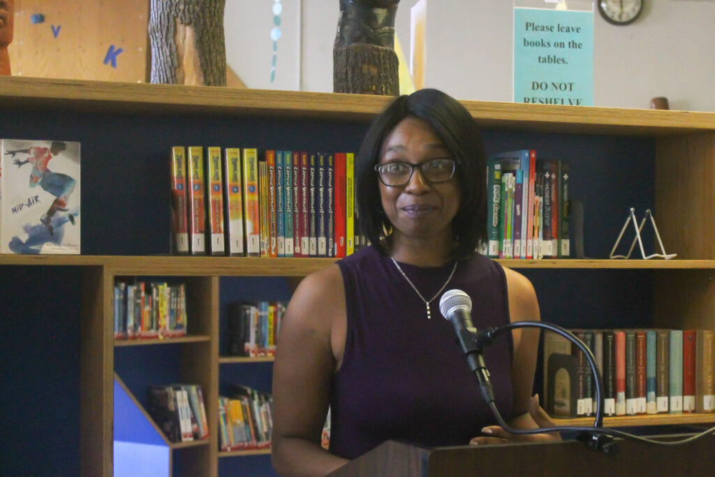 Imani Davis Community member Imani Davis, who sits on the Philly Joy Bank steering committee, called guaranteed income for pregnant people “life changing” during a press conference Sat., June 22, 2024 at Cecil B. Moore Library in Philadelphia. (Nicole Leonard/WHYY)