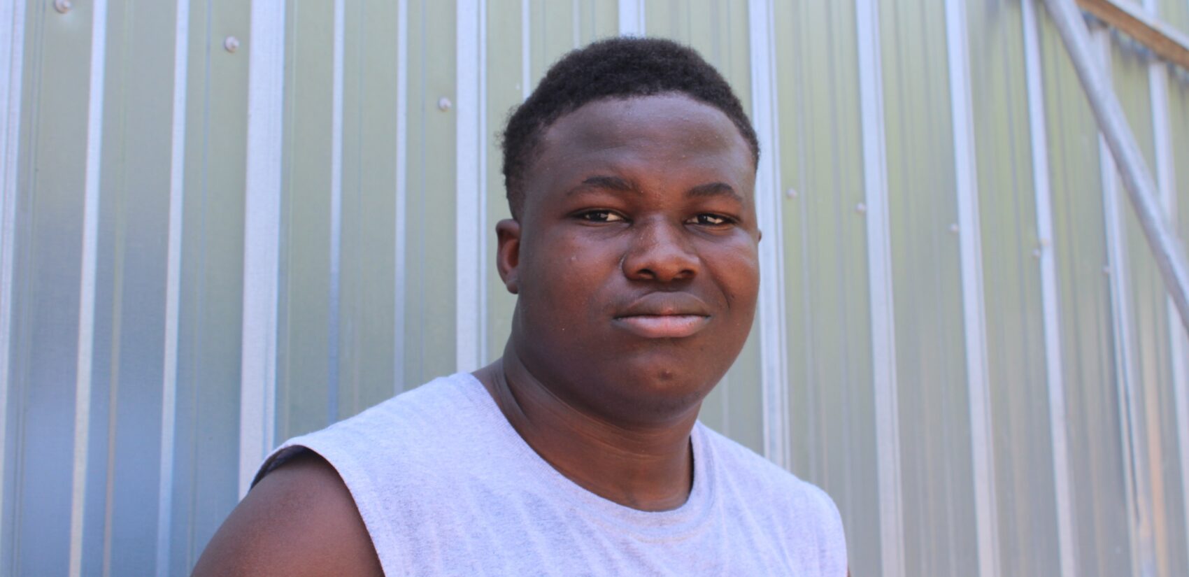 Ouedraogo Kris, 19, participated in AFAHO's after-school program. He said the community there has been like a 