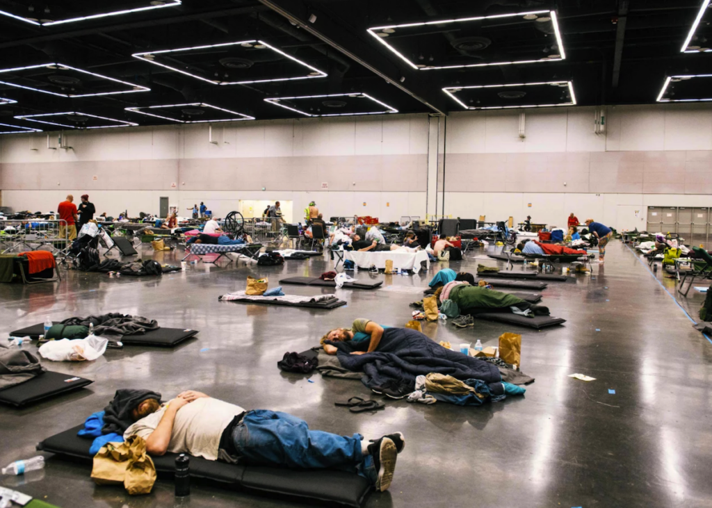 cooling-station-oregon-npr-getty-2024-06-18 People resting inside a cooling station