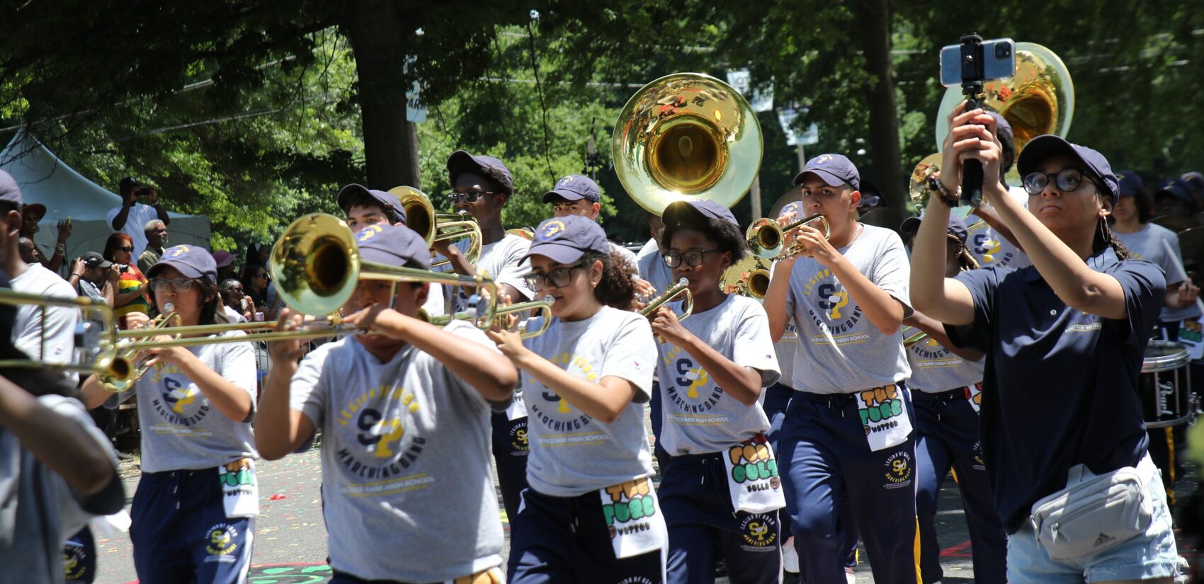 Philadelphia's Juneteenth Parade proceeded down 52nd Street from just outside the Mann Center to the festival at Malcolm X Park on June 16, 2024. (Cory Sharber/WHYY)