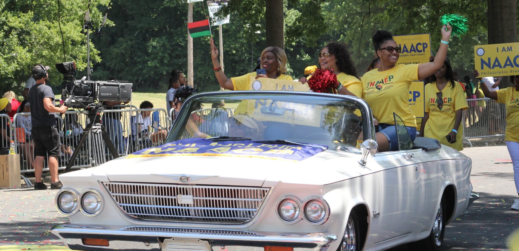 Philadelphia's Juneteenth Parade proceeded down 52nd Street from just outside the Mann Center to the festival at Malcolm X Park on June 16, 2024. (Cory Sharber/WHYY)